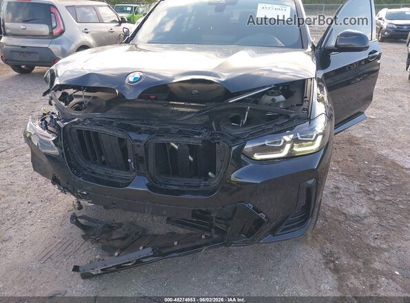 5UX33DT02R9U35651 2024 BMW X4 Black Widok z przodu