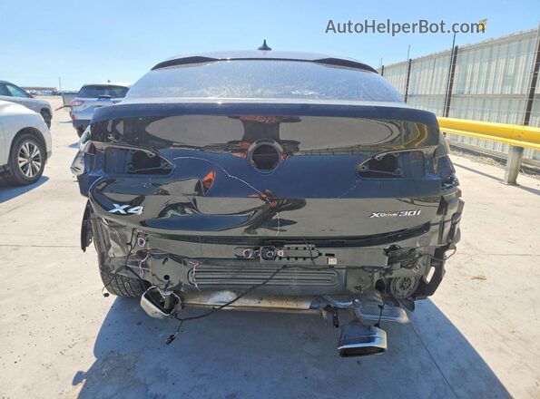 5UX33DT03R9W97548 2024 BMW X4 Black Вид ззаду