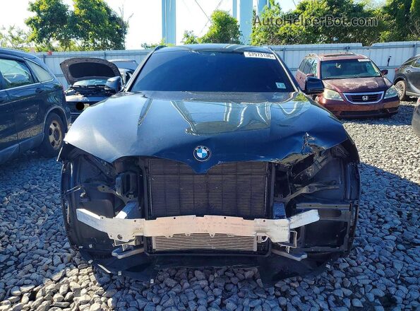 5UX33DT05P9N63508 2023 BMW X4 Черный Вид спереди