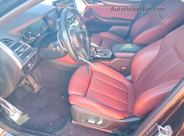 5UX33DT05P9N63508 2023 BMW X4 Черный Вид салона спереди