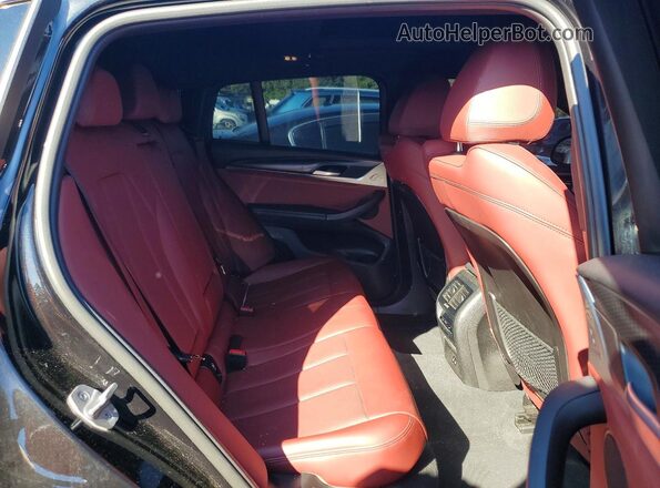 5UX33DT05P9N63508 2023 BMW X4 Черный Вид задней части салона