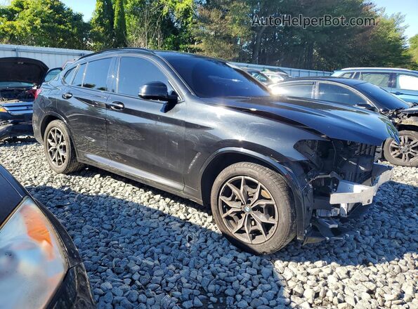 5UX33DT05P9N63508 2023 BMW X4 Черный Передняя правая четверть