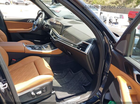 5UX33EU01T9044731 2026 BMW X5 Dark Blue Front interior view