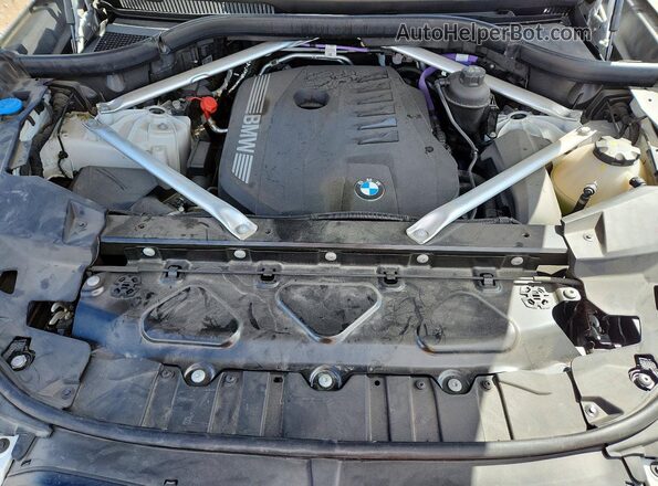 5UX33EX02R9S89218 2024 BMW X6 White Vista interior trasera