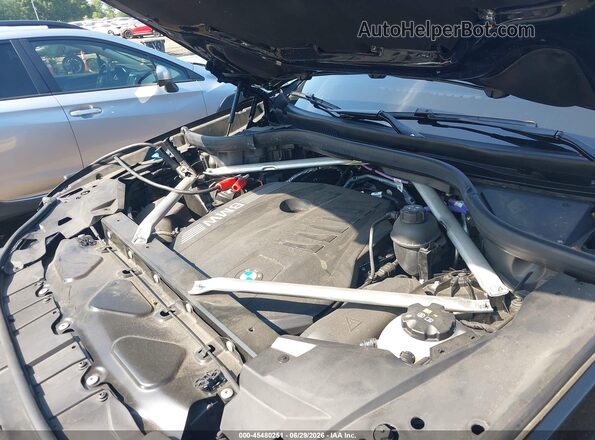 5UX33EX04R9S73070 2024 BMW X6 Black Vista trasera