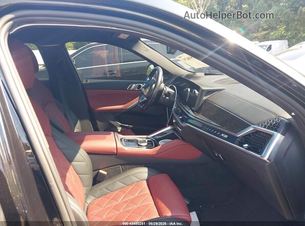 5UX33EX04R9S73070 2024 BMW X6 Black Vista interior delantera
