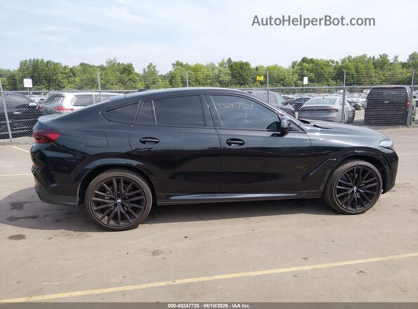 5UX33EX05R9U78624 2024 BMW X6 Black უკანა სალონის ხედი