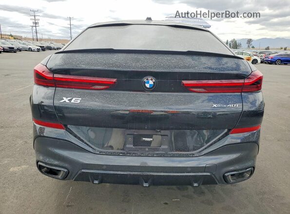 5UX33EX09R9S50500 2024 BMW X6 Black Vista trasera