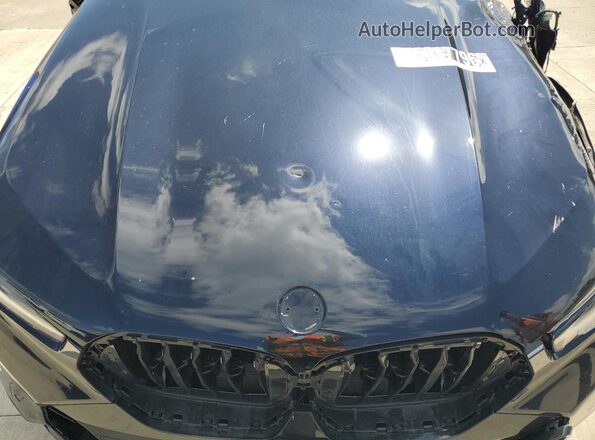 5UX33EX0XT9369633 2026 BMW X6 Black VIN sticker view
