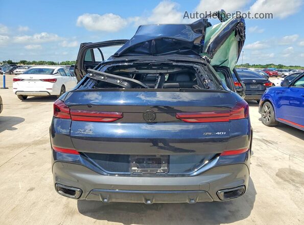5UX33EX0XT9369633 2026 BMW X6 Black Rear view