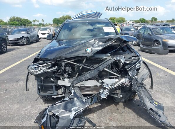 5UX43DP01N9K81653 2022 BMW X3 Black Widok wnętrza z tyłu