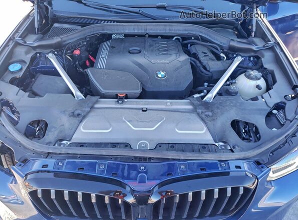5UX43DP03R9V70314 2024 BMW X3 Blue Vista del compartimento del motor