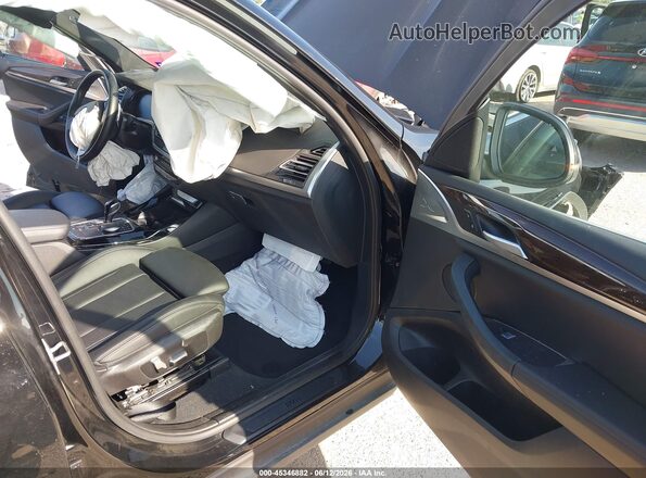 5UX43DP04N9M44473 2022 BMW X3 Black Vista interior delantera