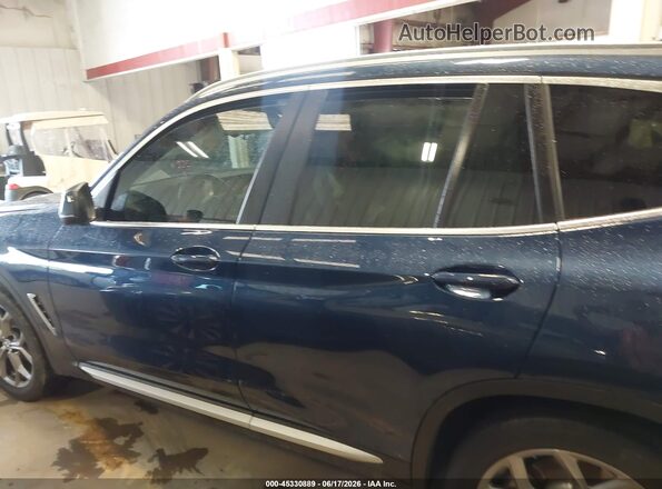 5UX43DP05R9V12527 2024 BMW X3 Синий Вид задней части салона