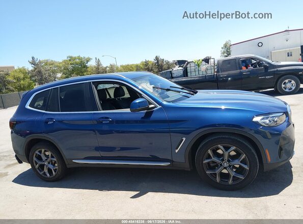 5UX43DP08P9P14503 2023 BMW X3 Blue Вид задньої частини салону