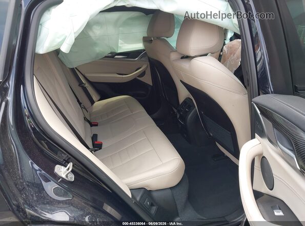 5UX43DT04P9P82450 2023 BMW X4 Blue VIN կոդի պիտակի տեսք