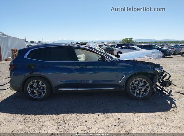 5UX53DP01R9V52351 2024 BMW X3 Blue Вид задньої частини салону