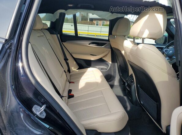 5UX53DP03R9U45270 2024 BMW X3 Blue Vista interior trasera