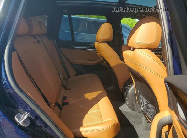 5UX53DP04N9M86694 2022 BMW X3 Blue Widok wnętrza z tyłu
