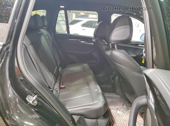 5UX53DP05P9P70371 2023 BMW X3 Black Rear interior view