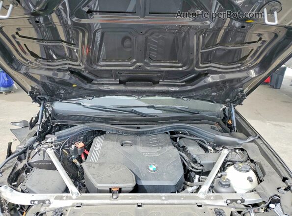 5UX53DP07R9W09541 2024 BMW X3 Gray Rear interior view