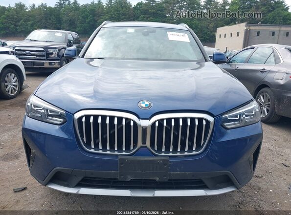 5UX53DP08N9N13556 2022 BMW X3 Синий Вид задней части салона