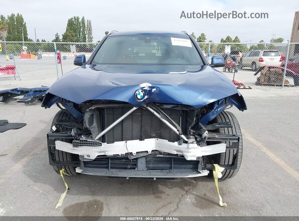 5UX53DP09N9J63466 2022 BMW X3 Blue Widok wnętrza z tyłu