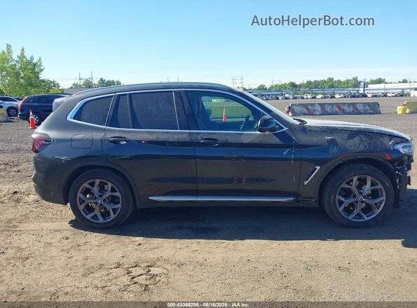 5UX53DP0XN9L24472 2022 BMW X3 Gray Vista interior trasera