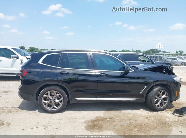 5UX53DP0XN9L80086 2022 BMW X3 Black Вид задньої частини салону