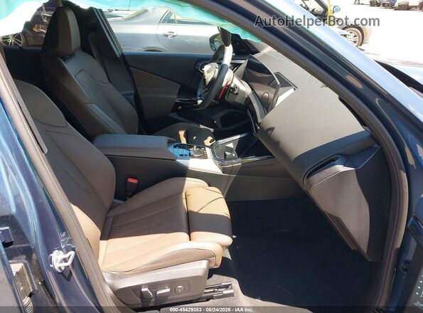 5UX73GP09S9100258 2025 BMW X3 Blue Widok wnętrza z przodu