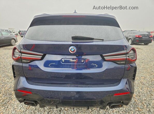 5UX83DP04P9P74134 2023 BMW X3 Синий Вид сзади