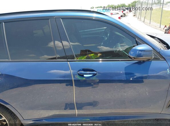 5UXCR4C01M9H63301 2021 BMW X5 Blue Vista interior trasera