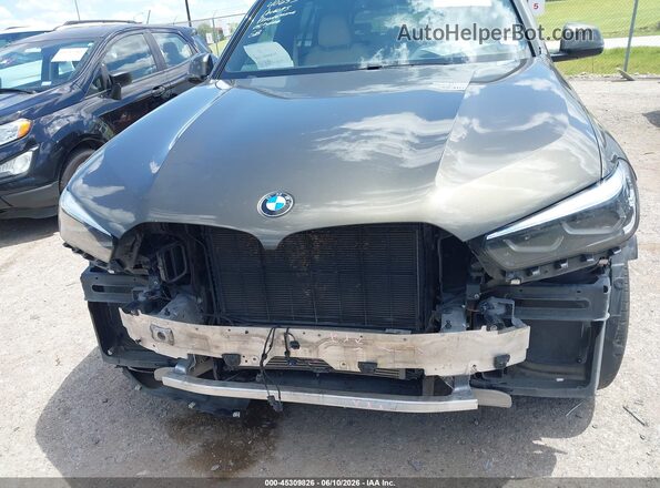 5UXCR4C06LLT19751 2020 BMW X5 Коричневый Вид задней части салона