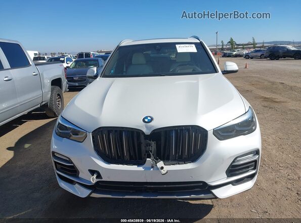 5UXCR4C07M9F13948 2021 BMW X5 White ხელსაწყოთა პანელის ხედი