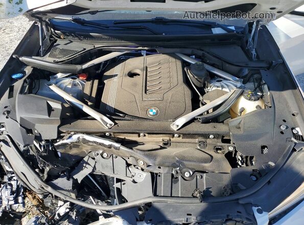 5UXCR4C08P9P47582 2023 BMW X5 White Rear interior view