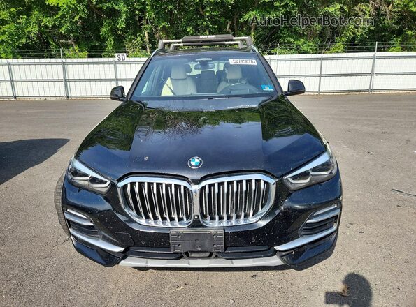 5UXCR6C03M9E57406 2021 BMW X5 Black Front view
