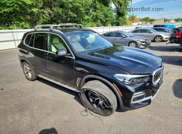 5UXCR6C03M9E57406 2021 BMW X5 Black Front right