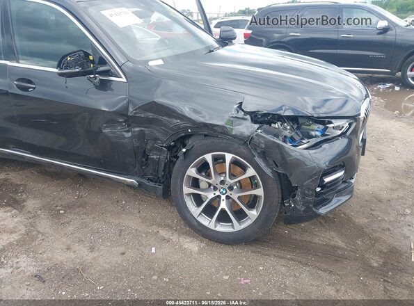 5UXCR6C09M9E67731 2021 BMW X5 Black Widok z przodu