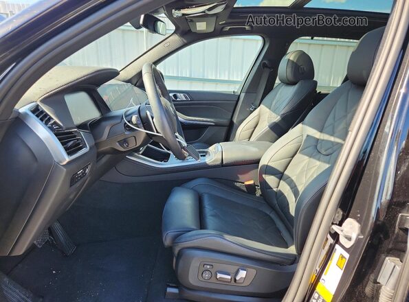 5UXCR6C0XP9R85140 2023 BMW X5 Black Front interior view