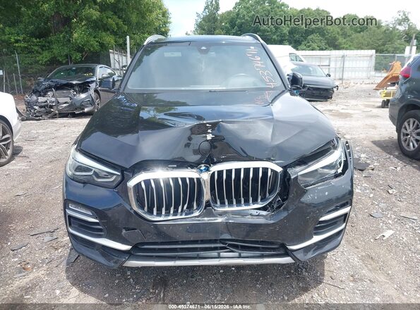 5UXCR6C58KLL52336 2019 BMW X5 Black Dashboard view