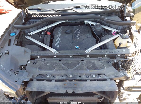 5UXCW2C00L9A02075 2020 BMW X7 Black Vista trasera
