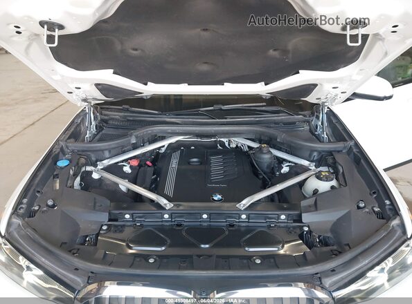 5UXCW2C02L9C57469 2020 BMW X7 White Вид ззаду