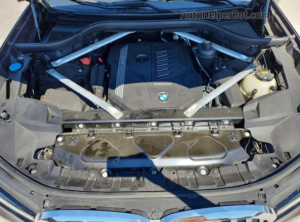 5UXCW2C08L9B58977 2020 BMW X7 Black Engine compartment view