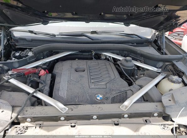 5UXCW2C08L9C16036 2020 BMW X7 Black Հետևի տեսք