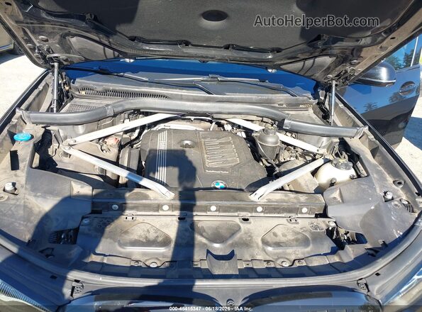 5UXCW2C0XM9E24288 2021 BMW X7 Черный Вид сзади
