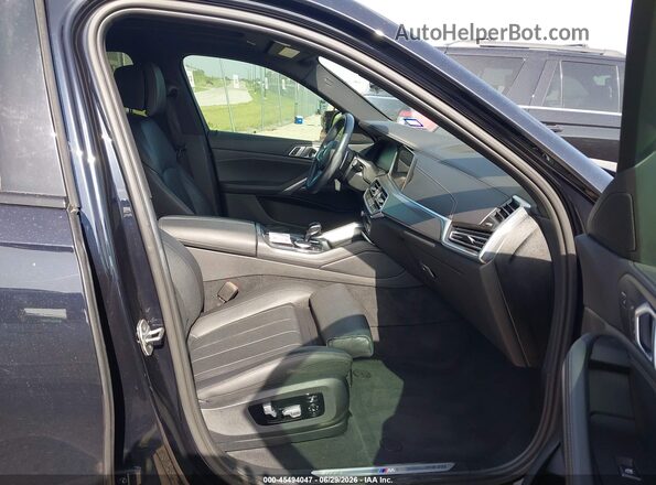 5UXCY4C07L9B65800 2020 BMW X6 Синий Вид салона спереди