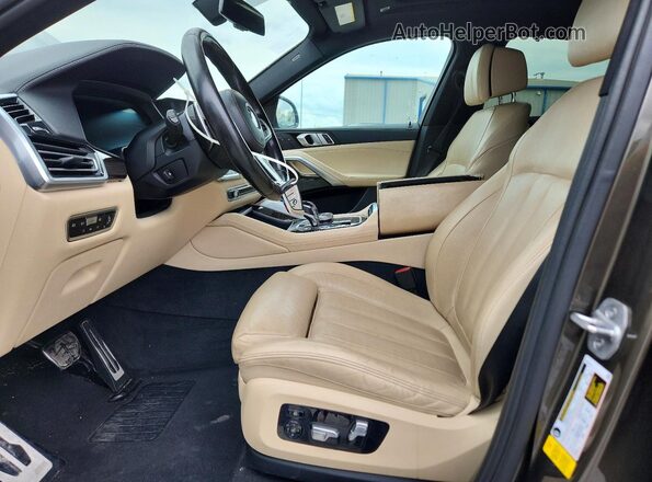 5UXCY4C07M9D83172 2021 BMW X6 Green Vista interior delantera