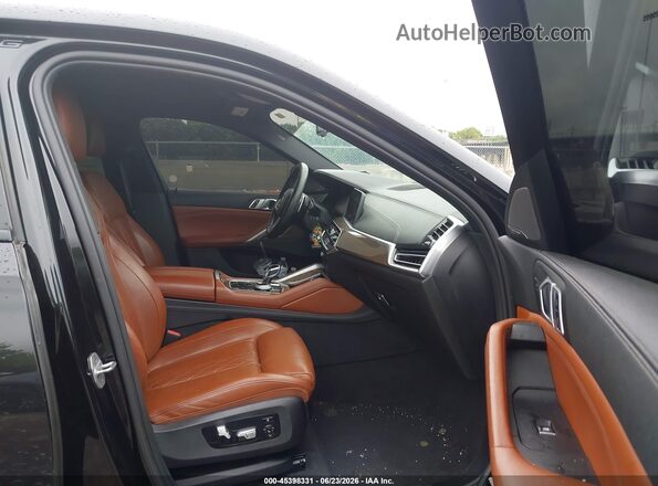 5UXCY4C09M9E23929 2021 BMW X6 Black Widok wnętrza z przodu