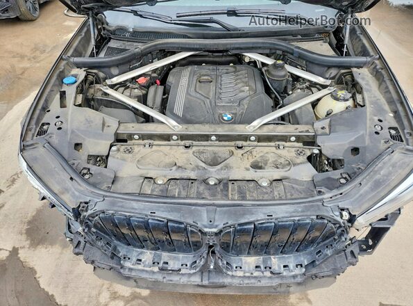 5UXCY6C06L9C89665 2020 BMW X6 Black Սալոնի հետևի տեսք