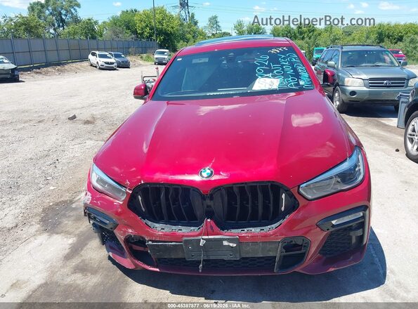 5UXCY6C06M9E36343 2021 BMW X6 Red Dashboard view